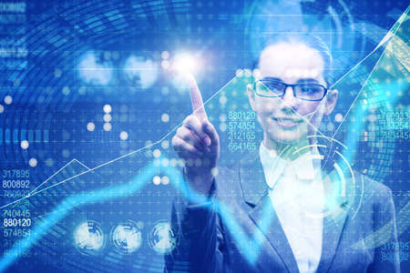 Businesswoman in stock trading business conceptの写真素材