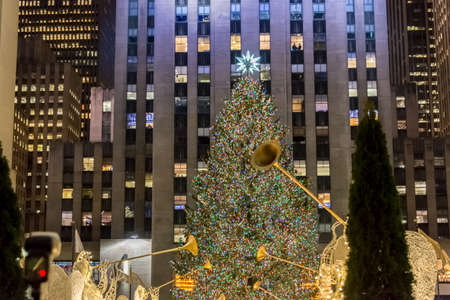 New York - DECEMBER 20, 2013: Christmas Tree at Rockefeller center on December 20 in USA, New York. Christmas Tree at Rockefeller center is the most famous christmas tree in USAのeditorial素材