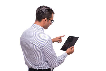 Businessman using his tablet computer isolated on whiteの写真素材