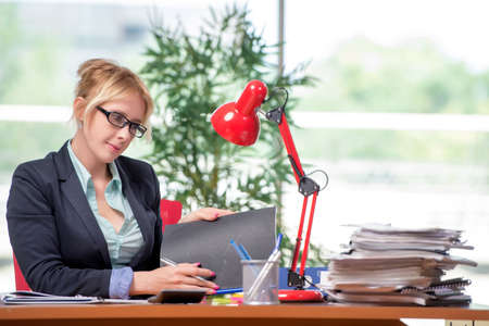 Businesswoman working in the officeの写真素材