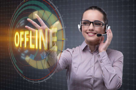 Businesswoman pressing virtual button offlineの写真素材