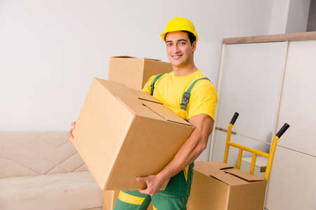 Man delivering boxes during house move