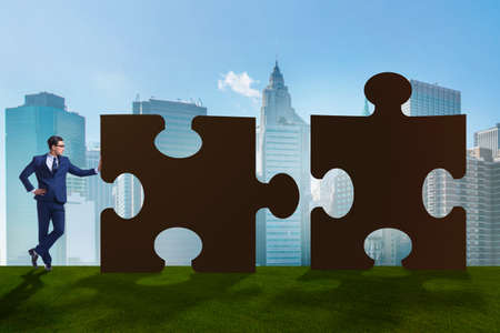 Business concept of puzzles for teamworkの写真素材