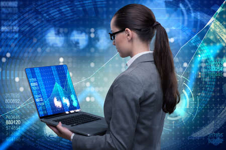 Businesswoman in online stock trading business conceptの写真素材