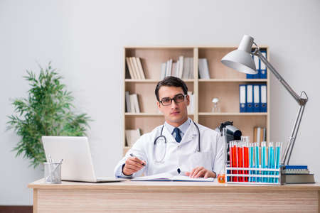 Man doctor working in the labの写真素材