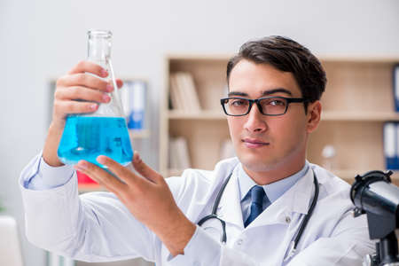 Man doctor working in the labの写真素材