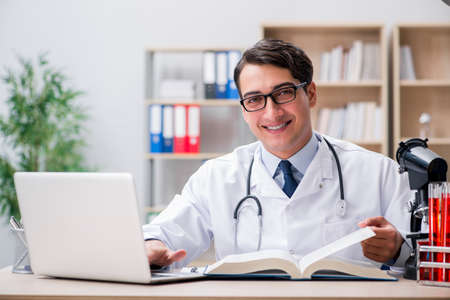 Young doctor studying medical education