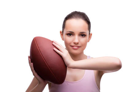 Woman with american football isolated on whiteの写真素材