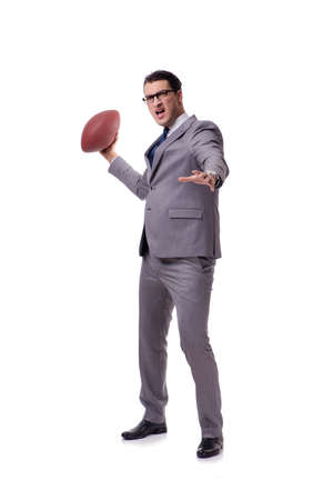 Businessman with american football isolated on whiteの写真素材