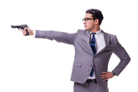 Aggressive business manager with handgun isolated on whiteの写真素材