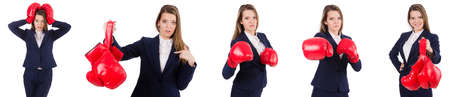 Woman businesswoman with boxing gloves on whiteの写真素材