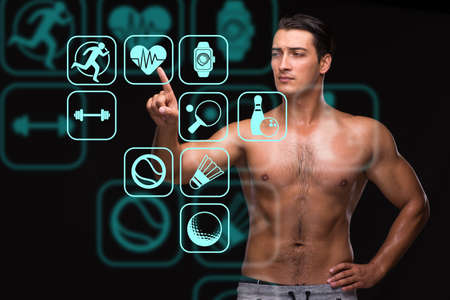 Young muscular man in sports conceptの写真素材