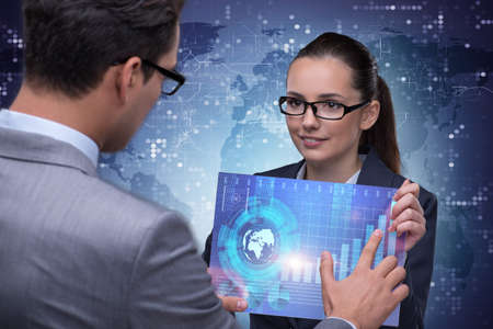 Business people discussing stock chart trends