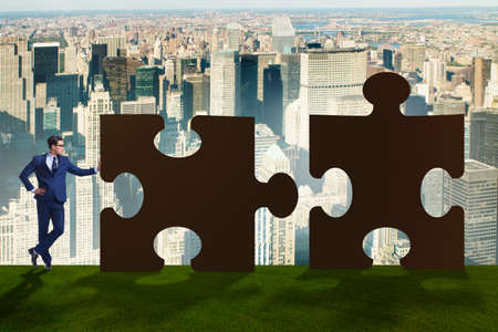 Business concept of puzzles for teamworkの写真素材