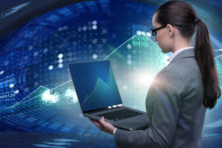 Businesswoman in online stock trading business conceptの写真素材