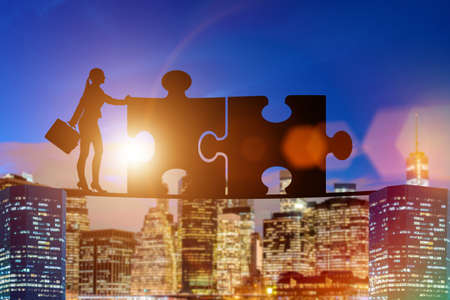 Business concept of teamwork with jigsaw puzzleの写真素材