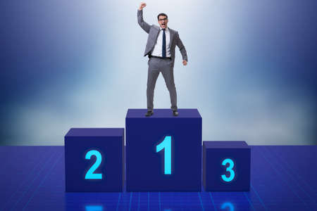 Businessman taking first place in competitionの写真素材