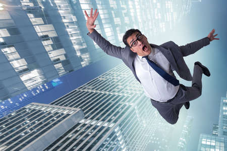 Businessman committing suicide due to crisisの写真素材