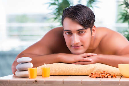 Handsome man during spa sessionの写真素材