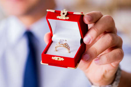 Romantic concept with man making marriage proposal