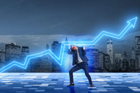 Businessman supporting increase in economyの写真素材