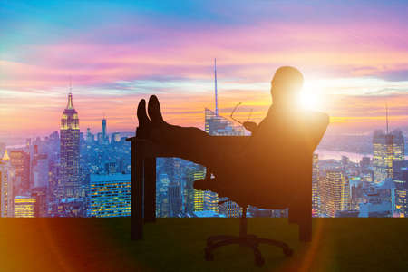 Businessman relaxing in the officeの写真素材