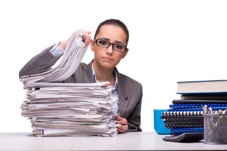 Young businesswoman in office isolated on whiteの写真素材