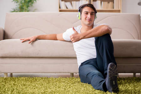 Handsome man listening to the musicの写真素材