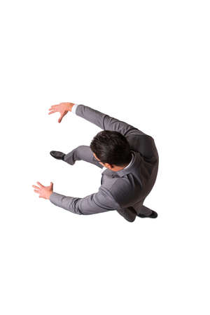 Falling businessman isolated on the white backgroundの写真素材