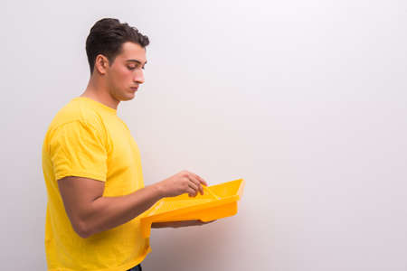 Man painting house in DIY conceptの写真素材