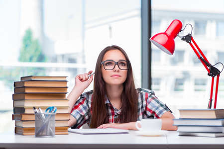 Young woman student preparing for college examsの写真素材