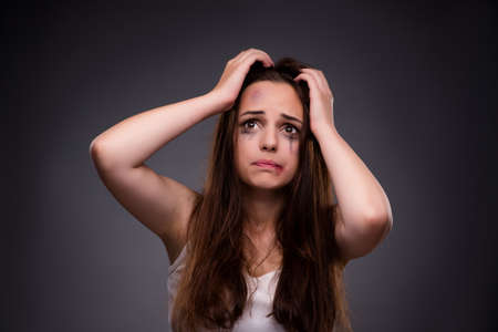 Woman in violence and discrimination conceptの写真素材
