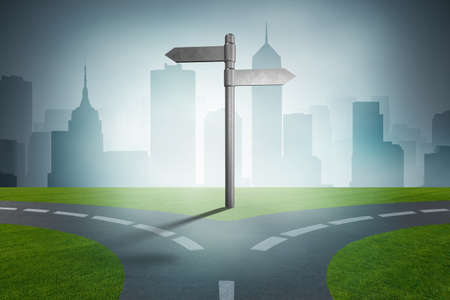 Road arrows at crossroads in difficult choice concept - 3d rendeの写真素材