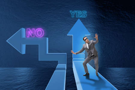 Businessman in difficult choice conceptの写真素材