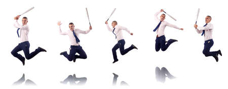 Jumping businessman with baseball bat