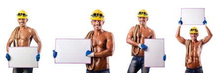 Naked construction worker on whiteの写真素材