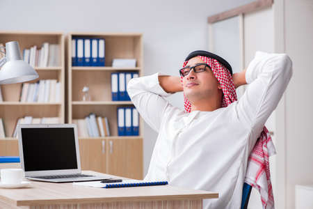 Young arab businessman in business conceptの写真素材