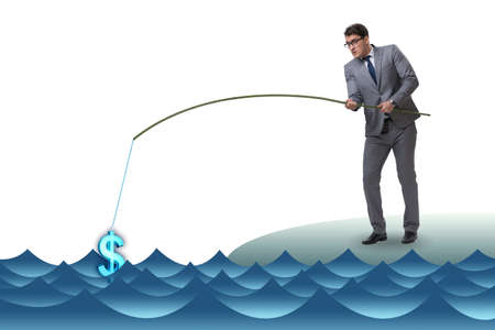 Businessman fishing out dollars from waterの写真素材