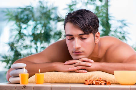 Handsome man during spa sessionの写真素材