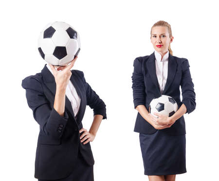Businesswoman with football on whiteの写真素材