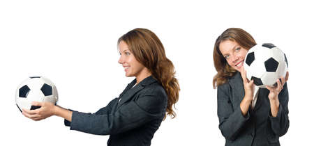 Businesswoman with football on whiteの写真素材
