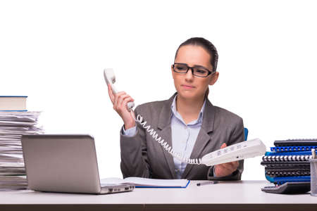 Young businesswoman in office isolated on whiteの写真素材