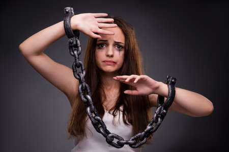 Woman in violence and discrimination conceptの写真素材