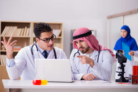Diversity concept with doctors in hospitalの写真素材