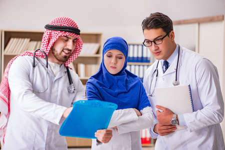 Diversity concept with doctors in hospitalの写真素材