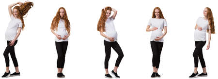 Pregnant woman in composite image isolated on whiteの写真素材