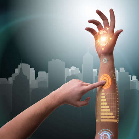 Human robotic hand in futuristic concept