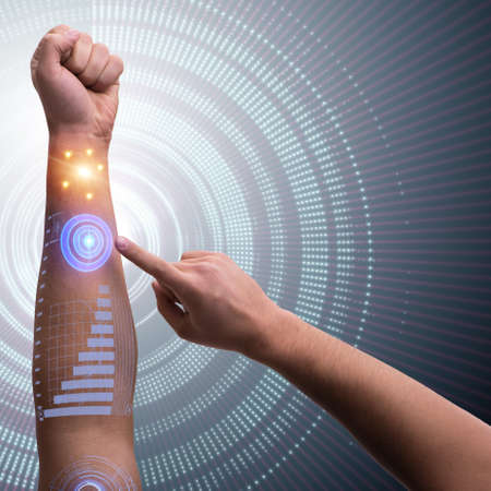 Human robotic hand in futuristic concept