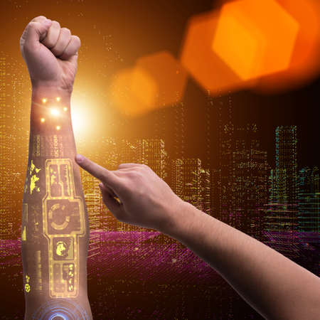 Human robotic hand in futuristic concept