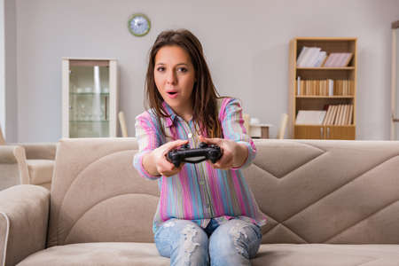 Young family suffering from computer games addiction